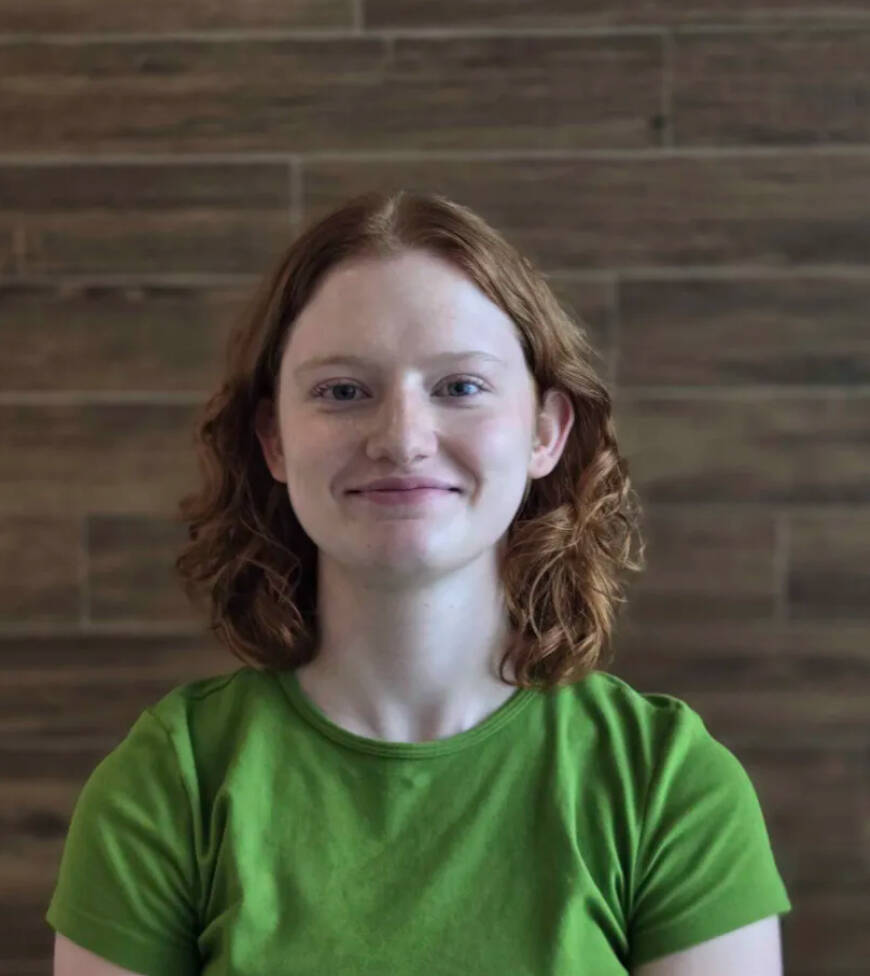 Student Regan smiling in portrait photo